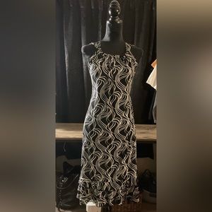 Plus size sleeveless midi swing dress